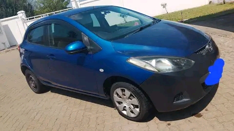 MAZDA DEMIO2 NEWSHAPE FOR SALE,FOR MORE INFORMATION..PLEASE CALL/WATSAP+266 57261610.KOLOI E FUMANEH